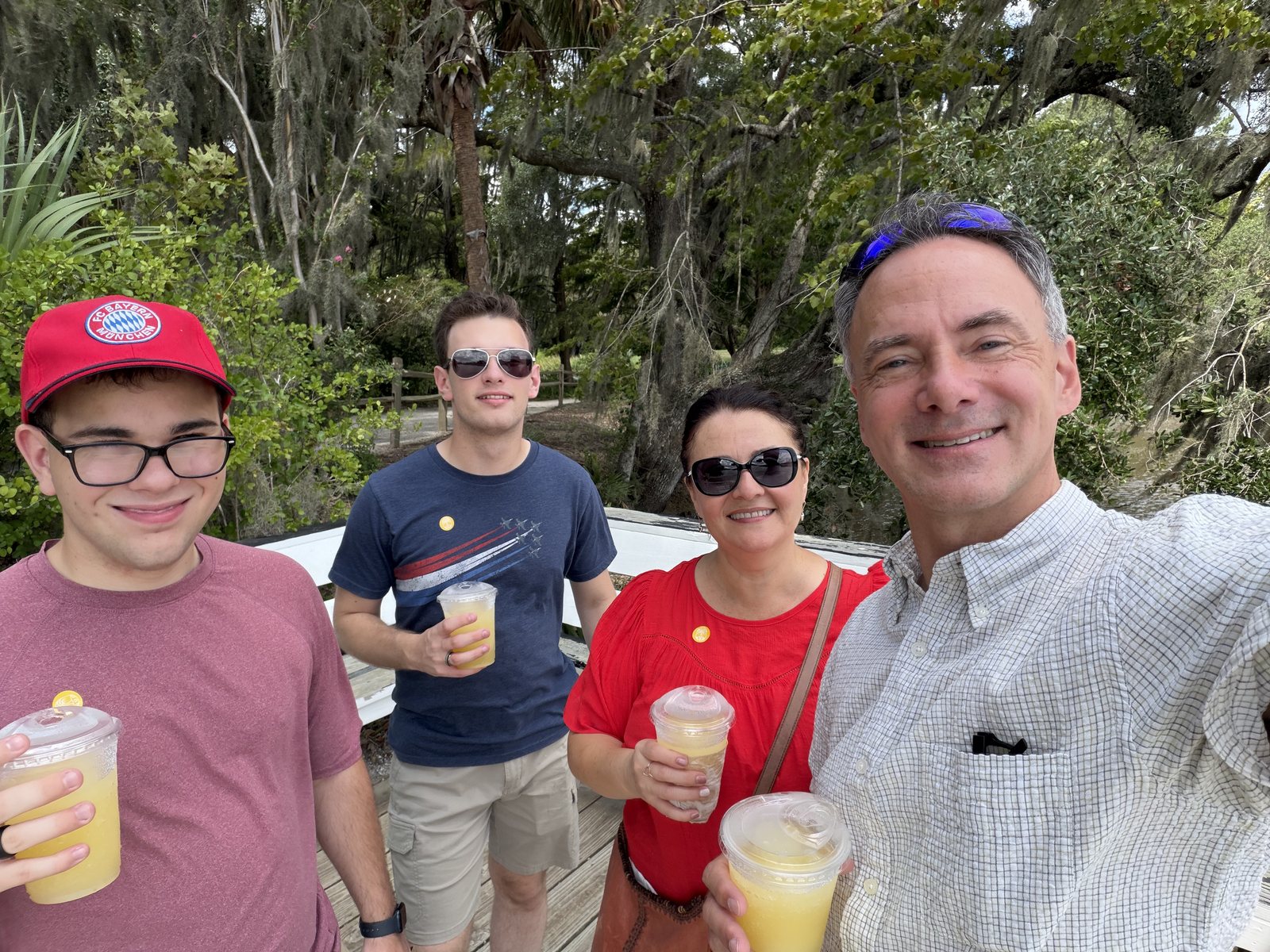 Four lemonades, four grins, the Ashley River behind us. Mommy's favorite hour of the trip.
