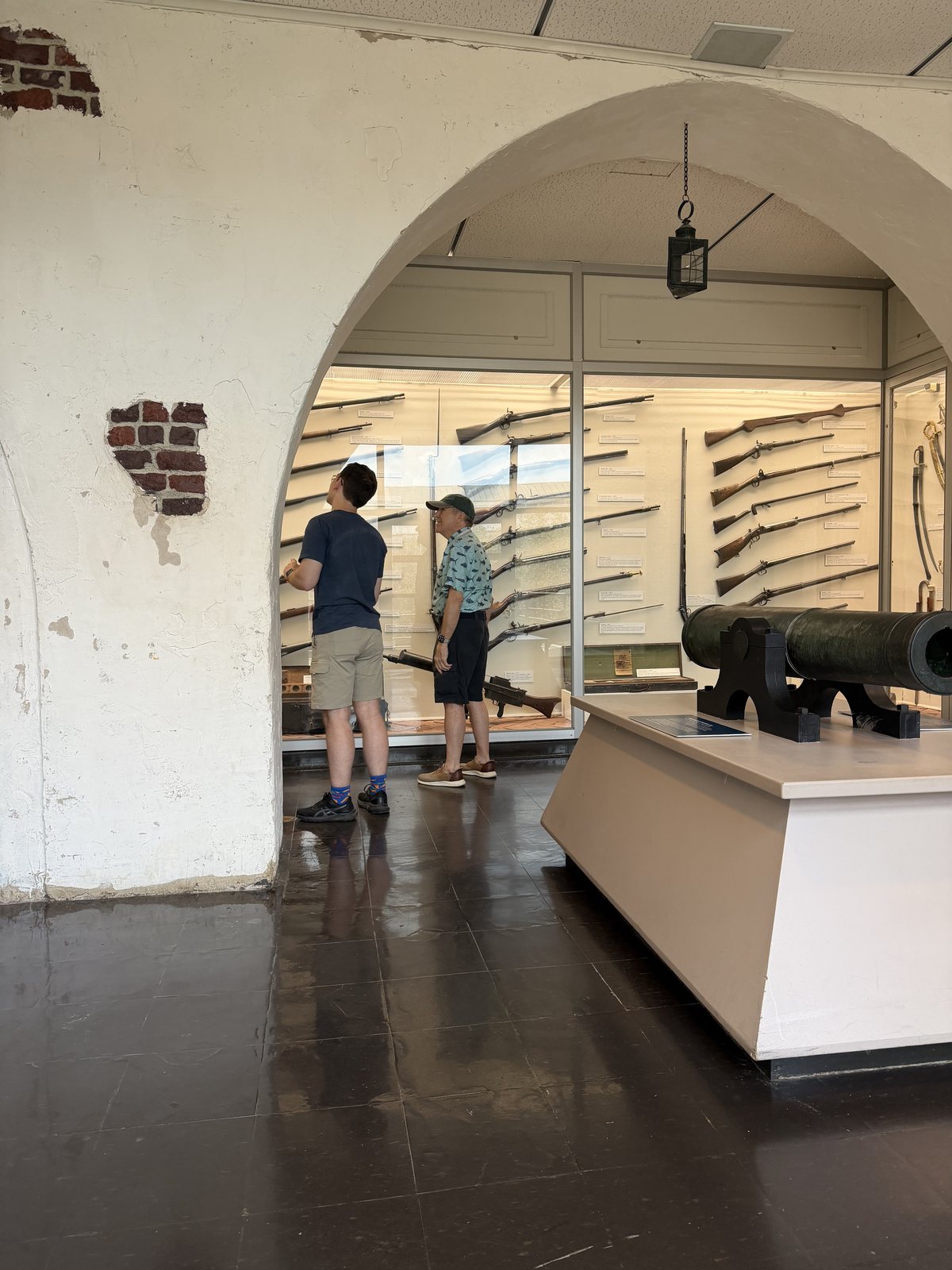 Travis, deep in the weapons gallery, cannon for company.