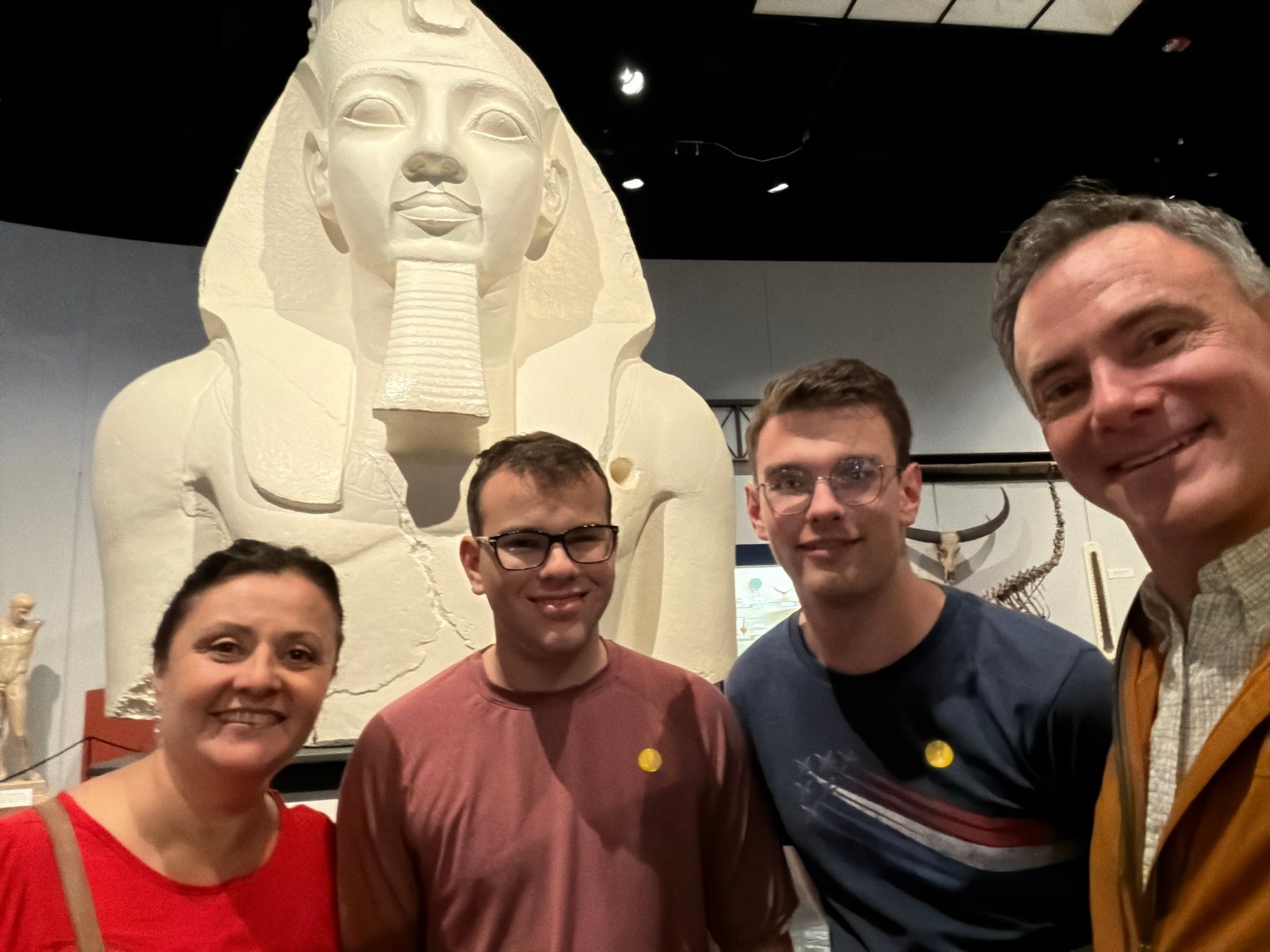 The Egyptian room. The giant statue behind us is a replica, but the room around it has the real thing — actual artifacts, actual centuries.