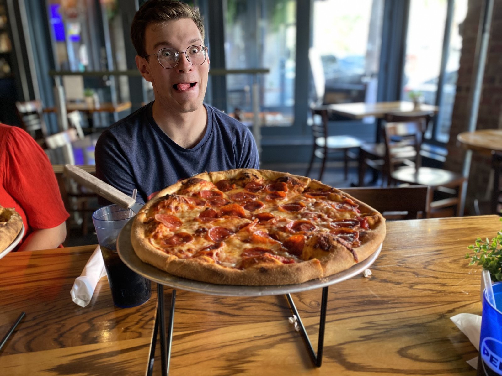 Travis meets the pizza. The pizza did not stand a chance.