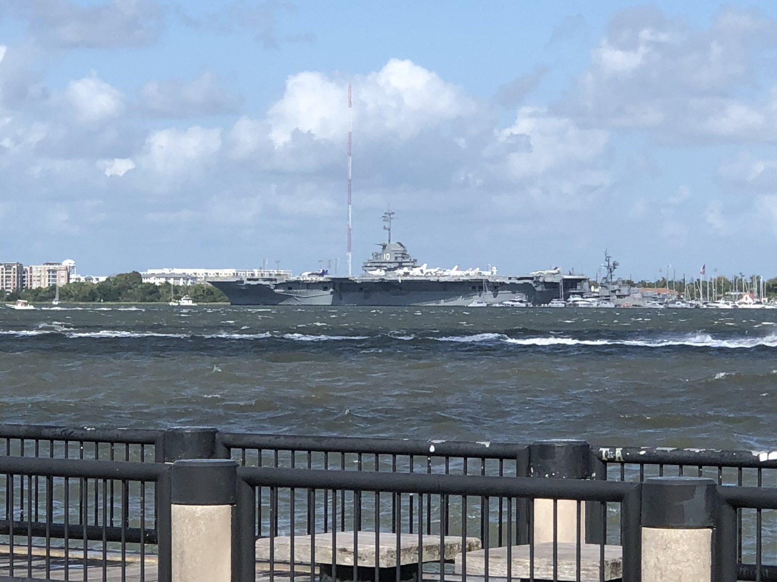 See that gray shape across the harbor? That's the USS Yorktown. We'll be standing on it in about 20 hours.