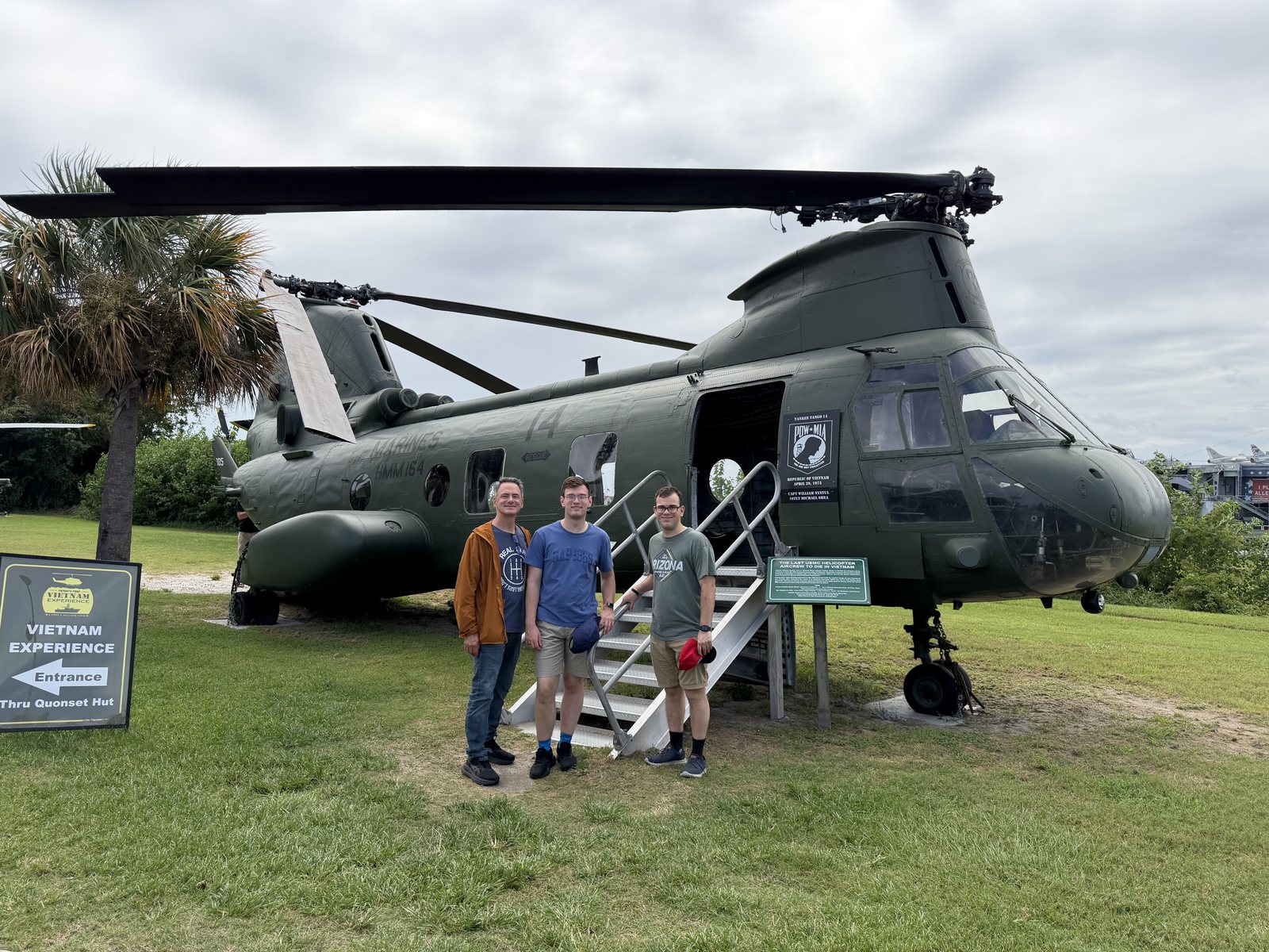 The Vietnam Experience exhibit: a CH-46 Sea Knight and a Huey, plus three guys pretending they're not sweating.