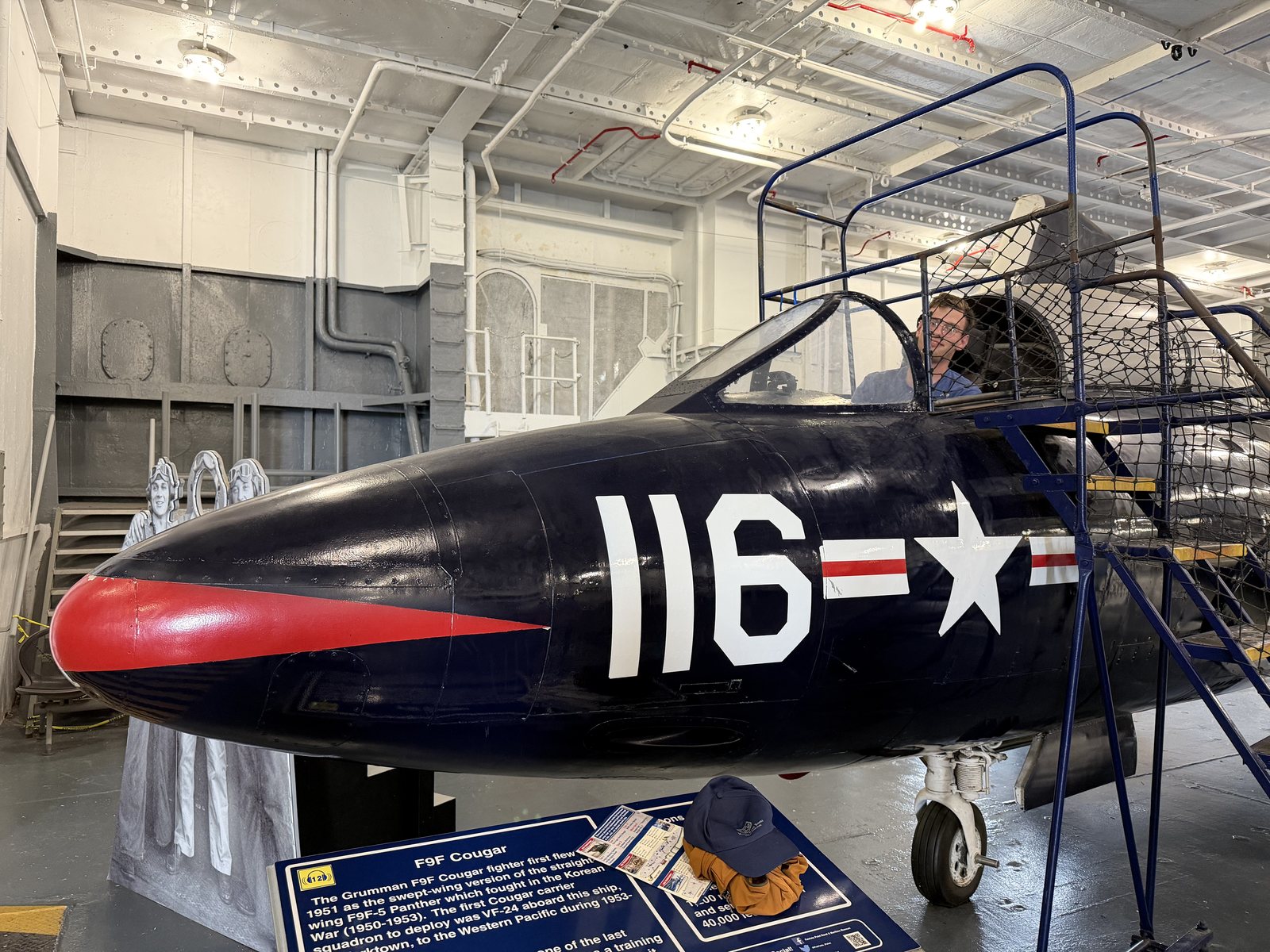 Cougar, pilot, and the ladder he'd rather not climb down.