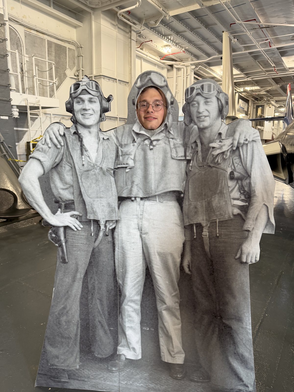 Travis standing in for the middle sailor. The cutout crew didn't mind. Travis kind of did, but he was a good sport about it.