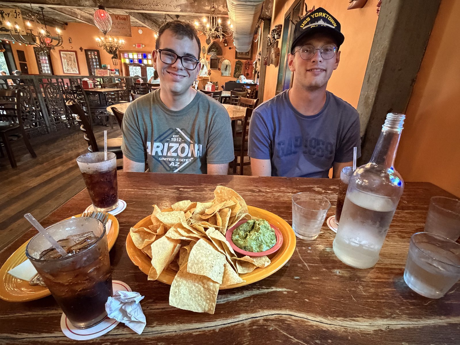 Taco Boy. Chips, queso, and Cokes for the boys.