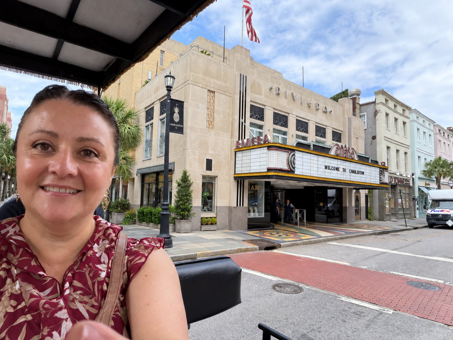Mommy on the carriage, passing our own front door — the Riviera's right behind her.