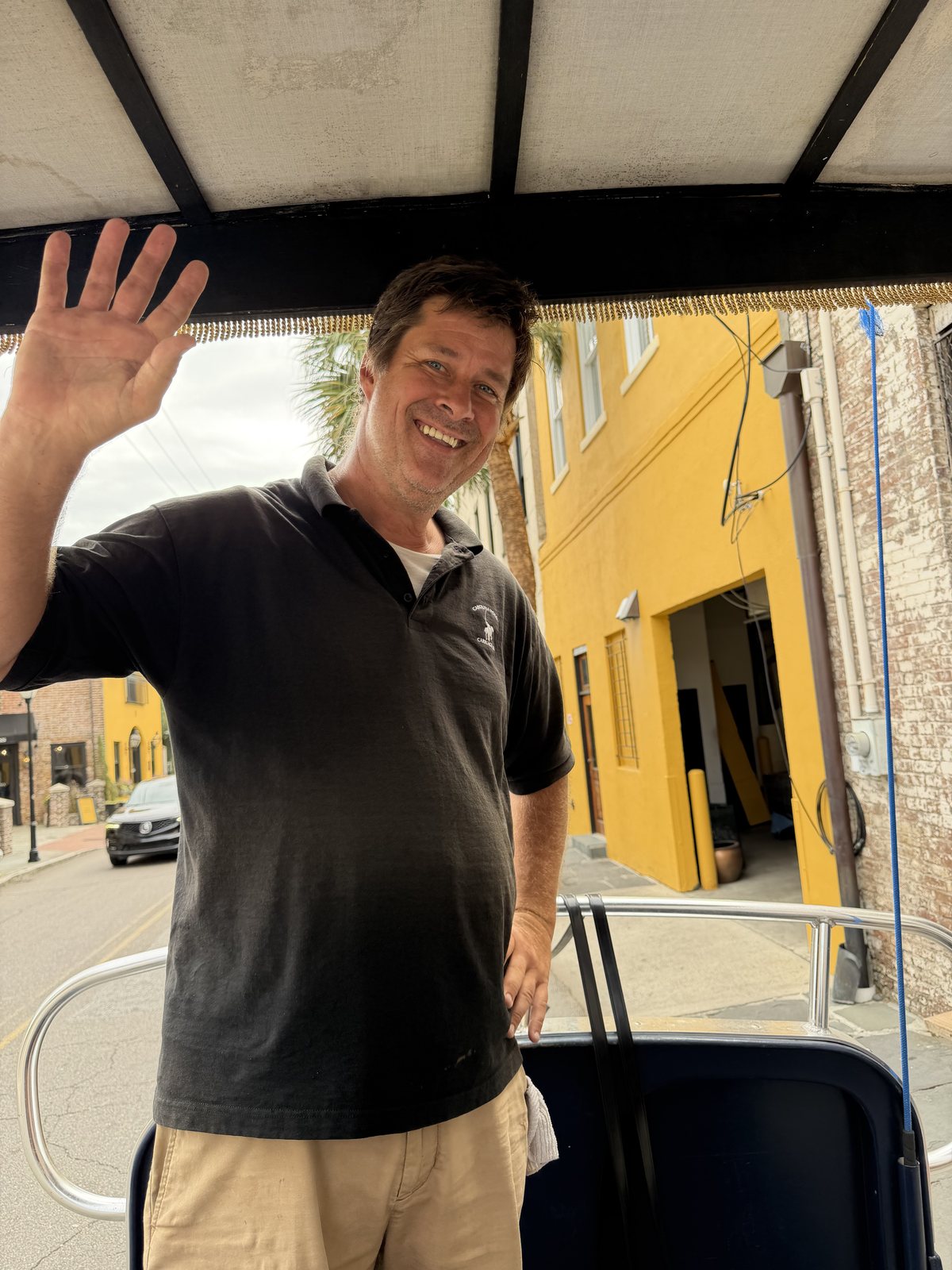 Daniel, our guide. Quick jokes, corny pirate jokes, and a wave for the camera.