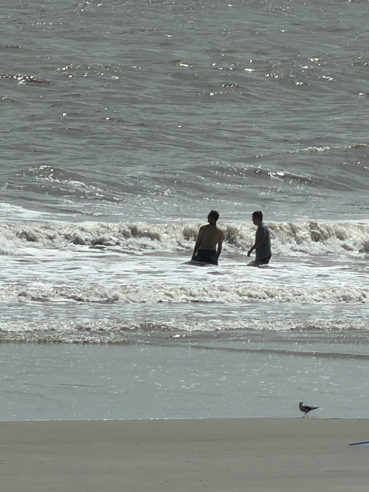 Dad and Liem in the surf. The Atlantic won on points, but it was close.