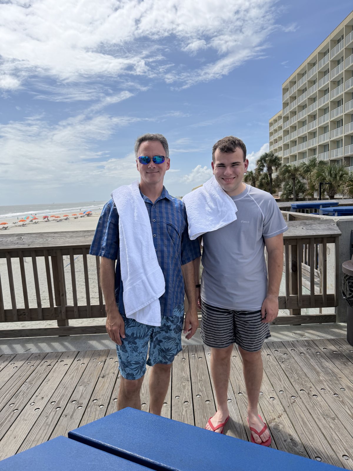 Dad and Liem, post-swim, towel-caped. 2:02pm.