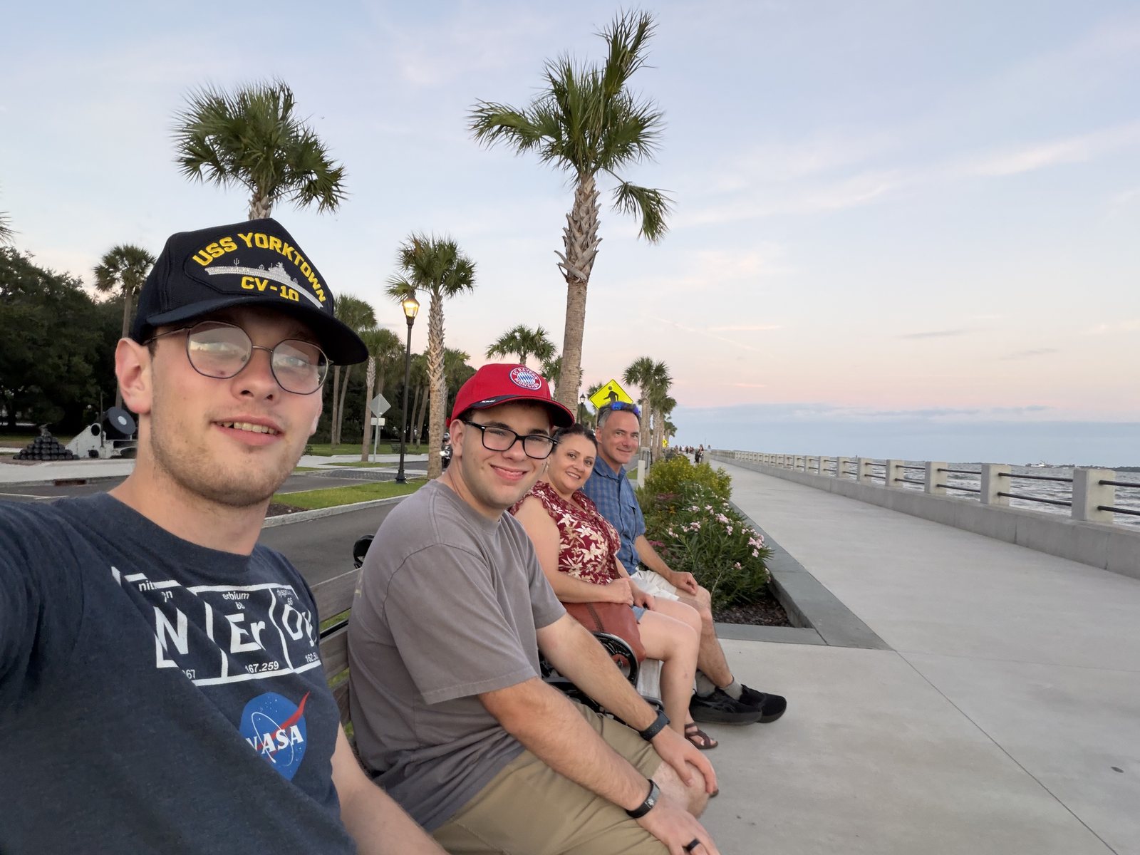 Murray Boulevard seawall. Travis still in the Yorktown hat, as he would be for the rest of the trip.