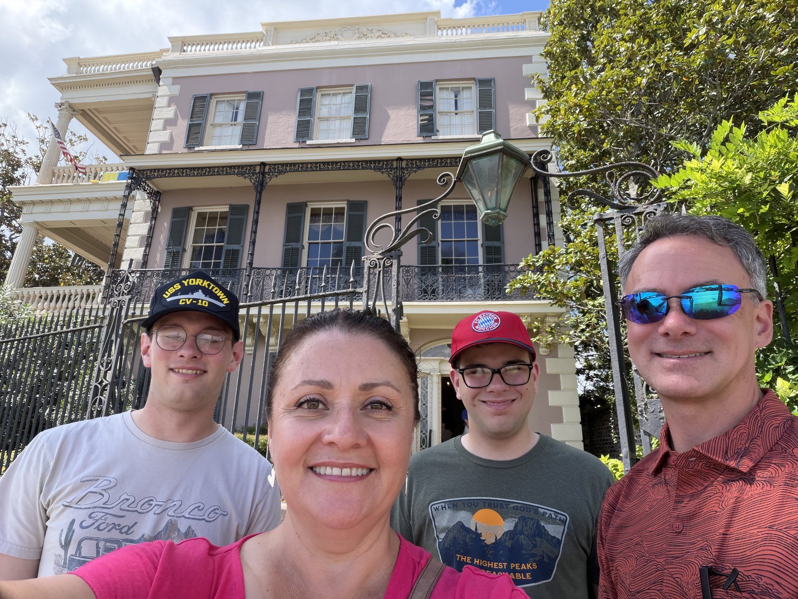 Edmondston-Alston House. The family in front; the harbor behind the family.